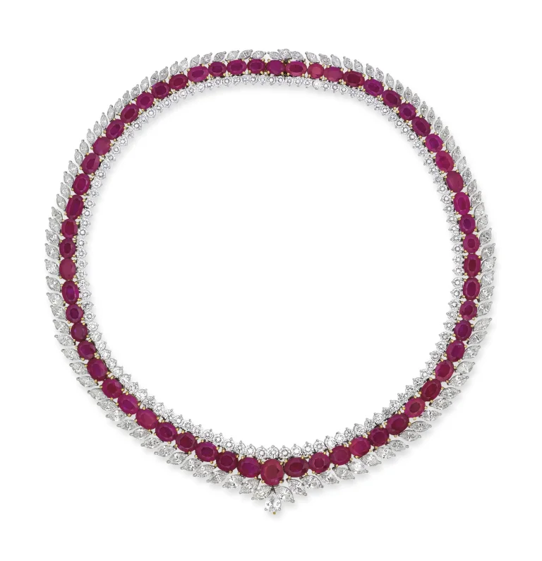 RUBY AND DIAMOND NECKLACE Fifty-nine oval-cut rubies, marquise, round and pear-shaped diamonds 100 carats
