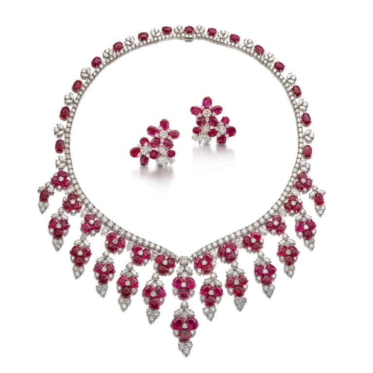 Ruby and diamond necklace necklace of floral motifs, set with oval and cushion-shaped rubies weighing 94.28 carats in to