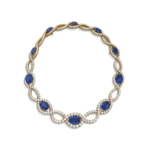 SAPPHIRE AND DIAMOND NECKLACE Oval-shaped sapphires, round diamonds, 18k yellow gold
