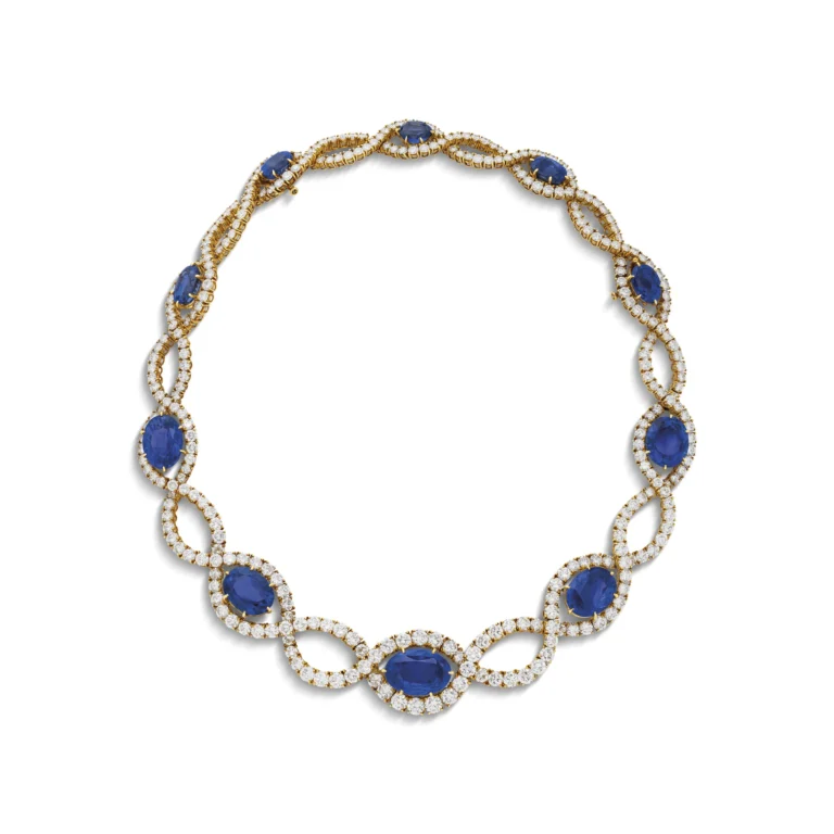 SAPPHIRE AND DIAMOND NECKLACE Oval-shaped sapphires, round diamonds, 18k yellow gold
