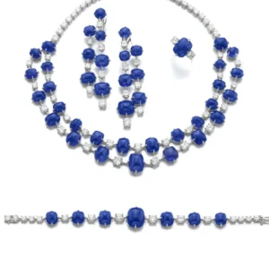 Sapphire and diamond necklace set | Comprising: a necklace composed of two graduated lines of sugarloaf cabochon sapphi~