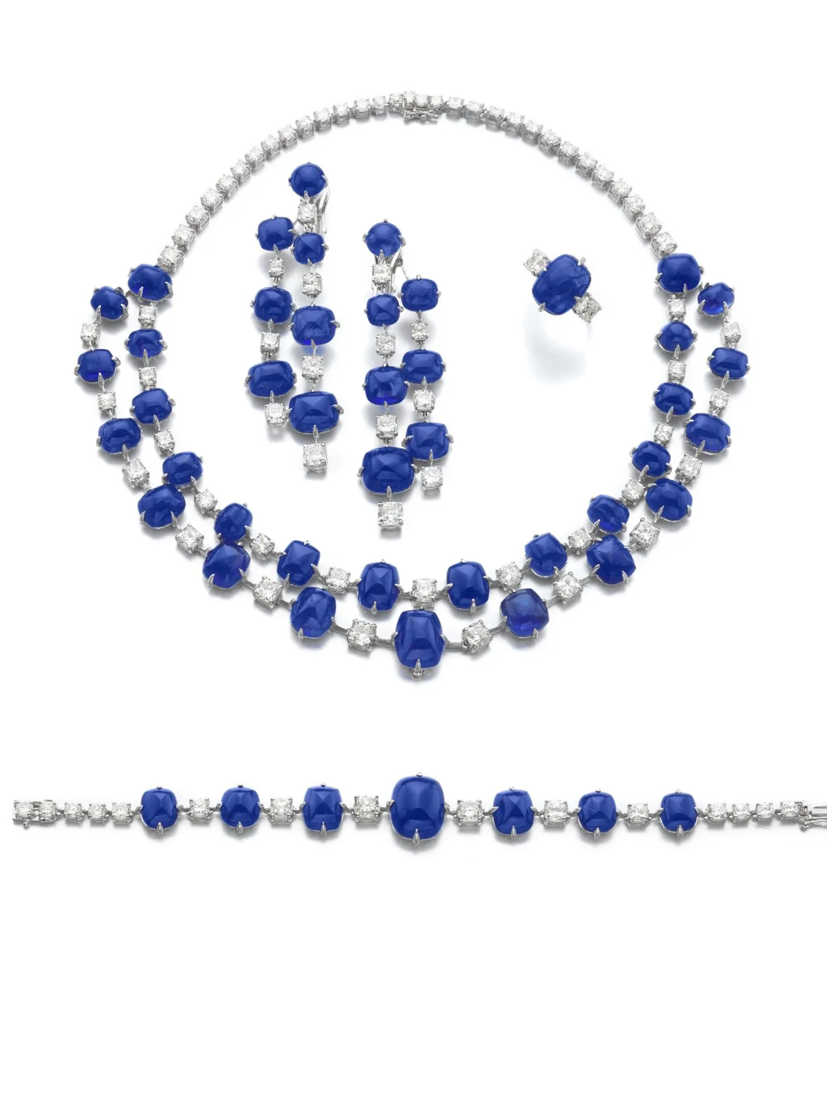 Sapphire and diamond necklace set | Comprising: a necklace composed of two graduated lines of sugarloaf cabochon sapphi~