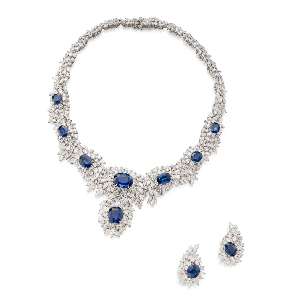 Sapphire and diamond necklace set |The necklace of cluster design, set with marquise and round diamonds, the front featu