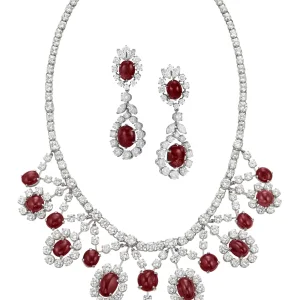 SET OF RUBY AND DIAMOND JEWELRY Oval and round cabochon rubies, round and marquise-cut diamonds, platinum