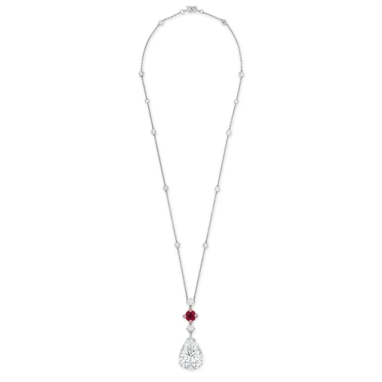 STUNNING DIAMOND, RUBY AND COLOURED DIAMOND PENDENT NECKLACE Pear brilliant-cut diamonds of 22.18 carats, cushion-shaped