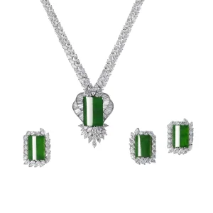 SUITE OF JADEITE AND DIAMOND JEWELLERY Carved jadeite plaques, the largest measuring approximately 23.0 x 15.5 x 4.8 mm