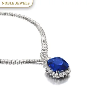 The necklace decorated with marquise-shaped and brilliant-cut diamonds, supporting a detachable pendant set with a cushi